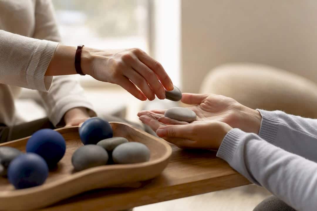Therapist using grounding tools in calm session