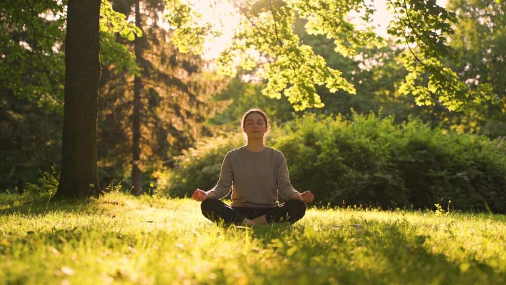 Mindfulness practice in nature, emphasizing relaxation and tranquility