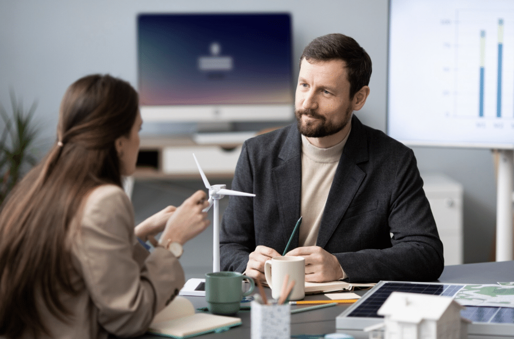 Two professionals meeting at a desk during a clinical supervision and consultation session in Paramus, New Jersey